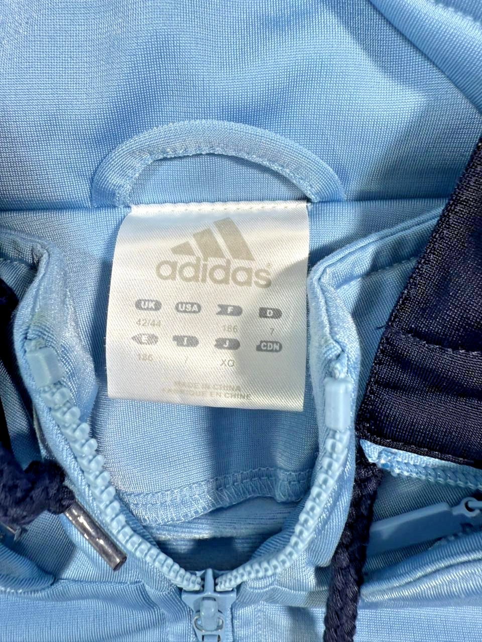 Adidas Track Jacket In Light Blue And Navy Blue With A Hood - Size M