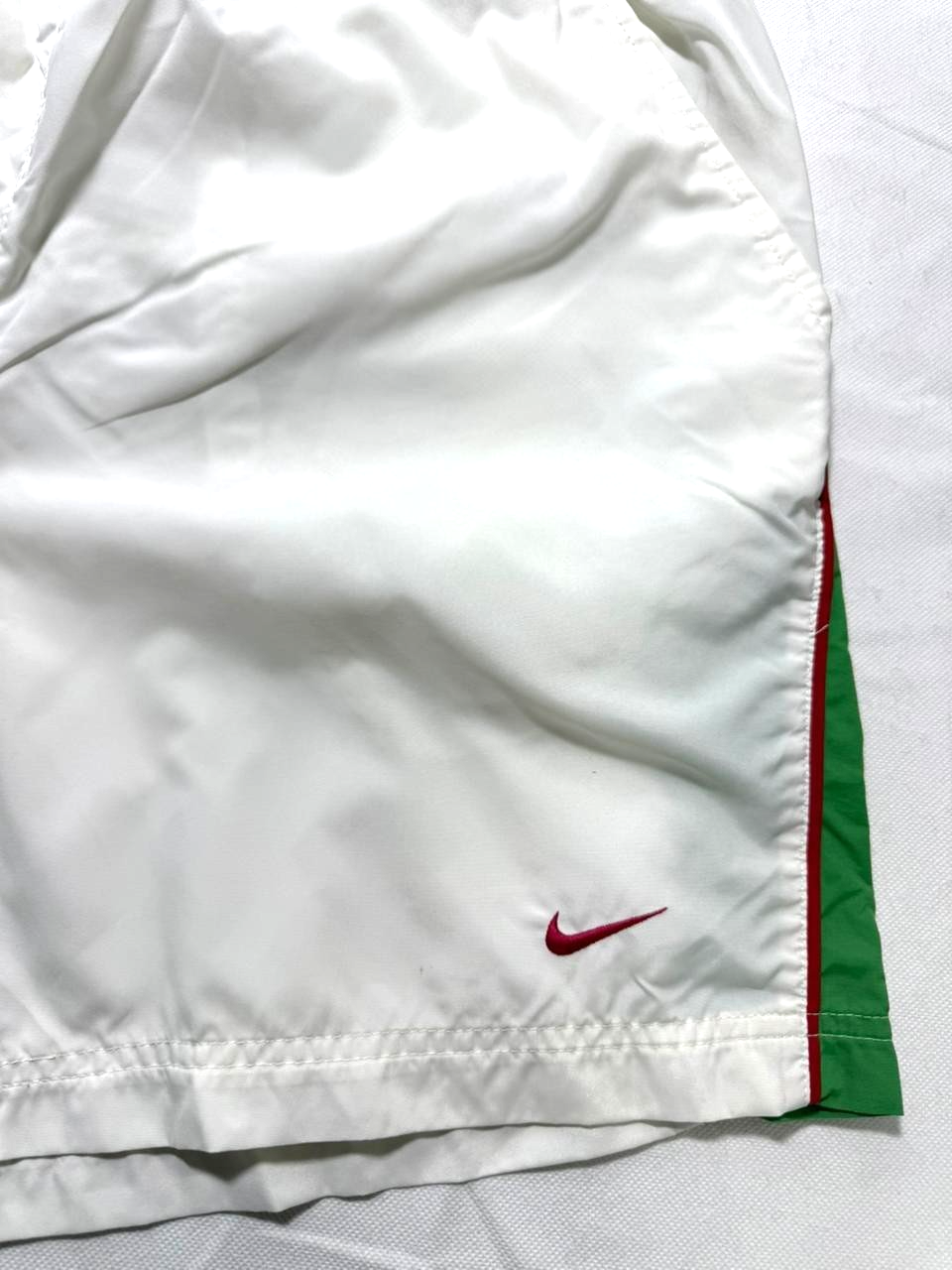 Nike Athletic Shorts In White With A Red Stripe And Green Paneling - Size L