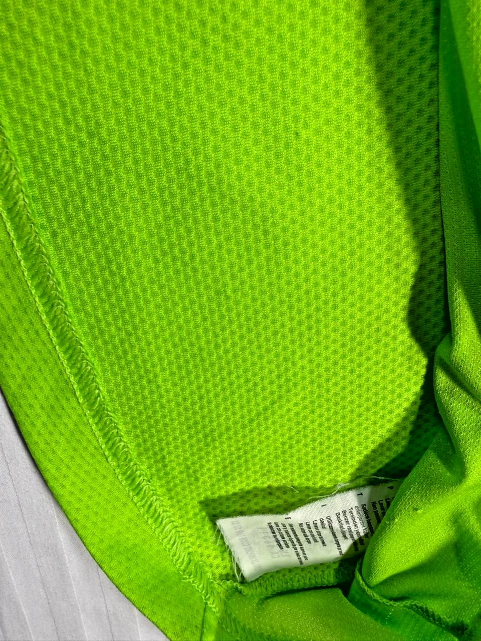 Puma Neon Green Performance T-Shirt With A Blue Graphic Log - Size S